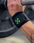 Reyllen No Thumb Loop Wrist Support Lifting Wraps Black worn on wrist lifting barbell
