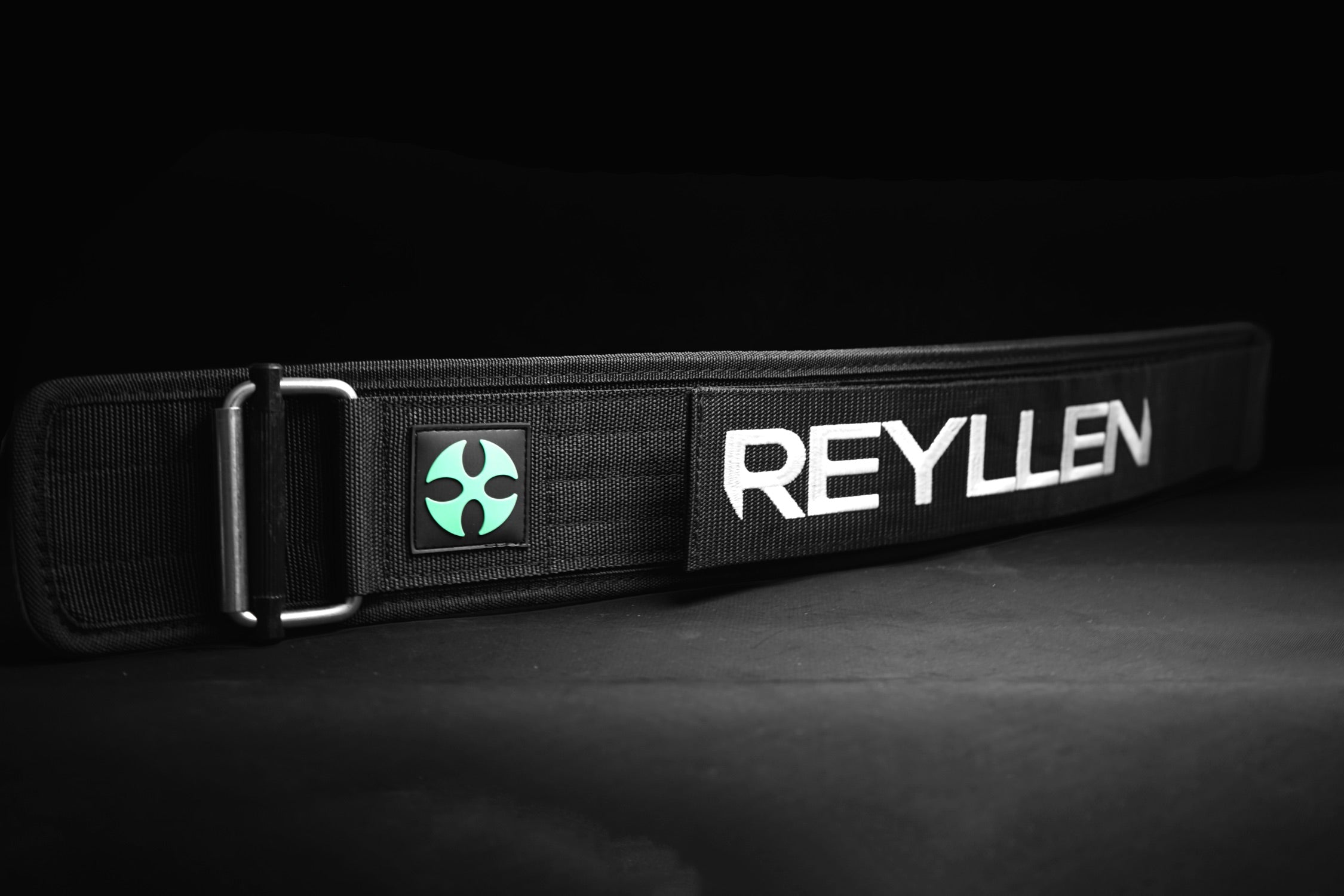 Reyllen GX Nylon 4" Weigh Lifting Belt Black - laid flat on side view 